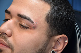 piercings at stix n sudz - eyebrow and ear
