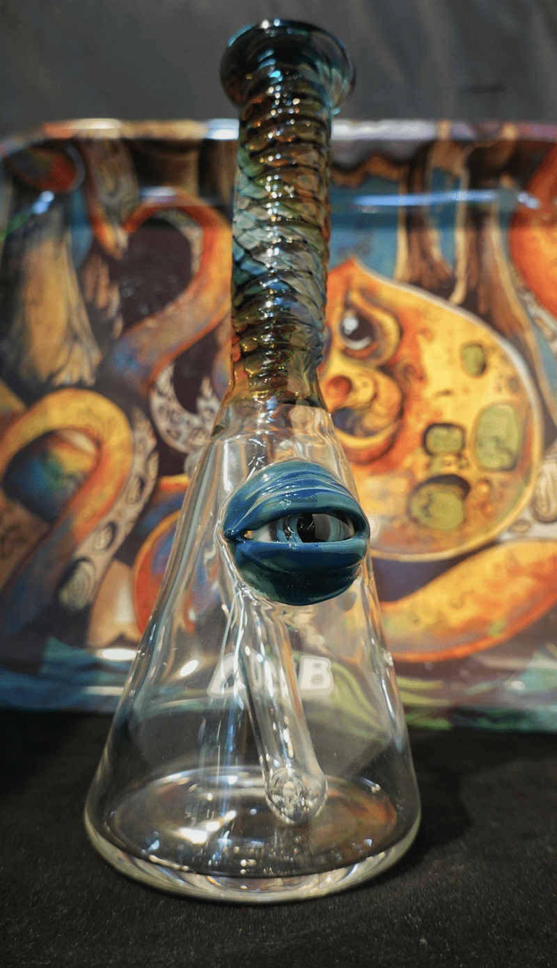 bong with an eye and fish scales